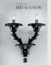 mur avec deux lumières avec des gouttes de plomb et noir et chrome