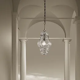 Lanterne couleur ambre avec finitions en acier brut